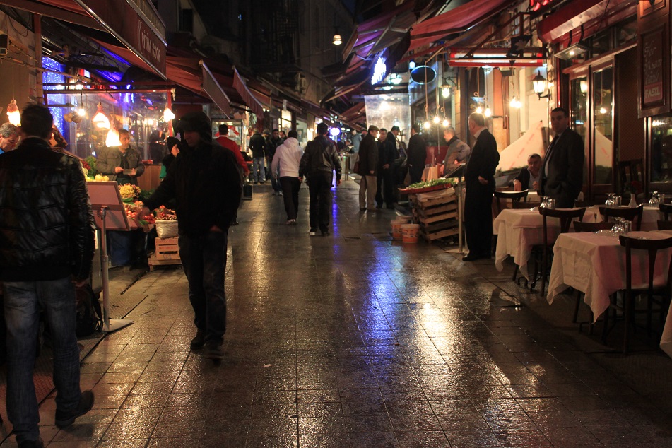 An Alley Dotted with Open-Air Restaurants and Fresh Produce Vendors