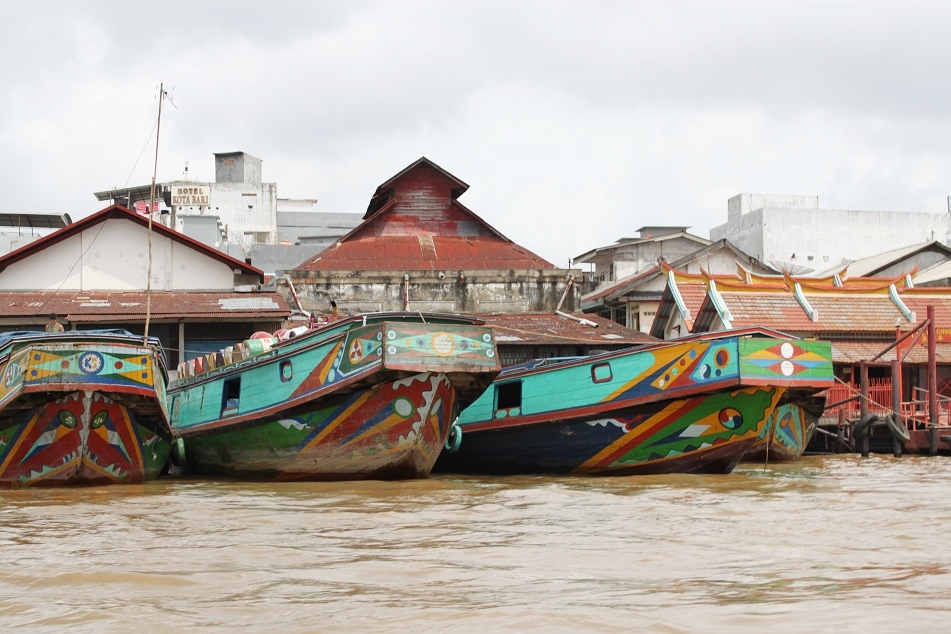 Colorful Boats along the Musi River