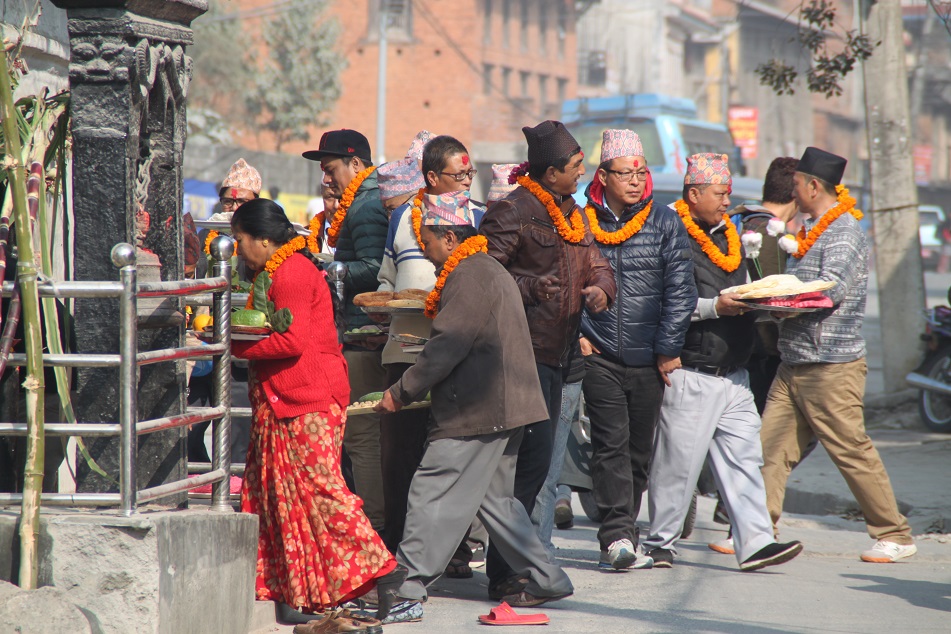 Local Men and Women with Offerings, Pokhara