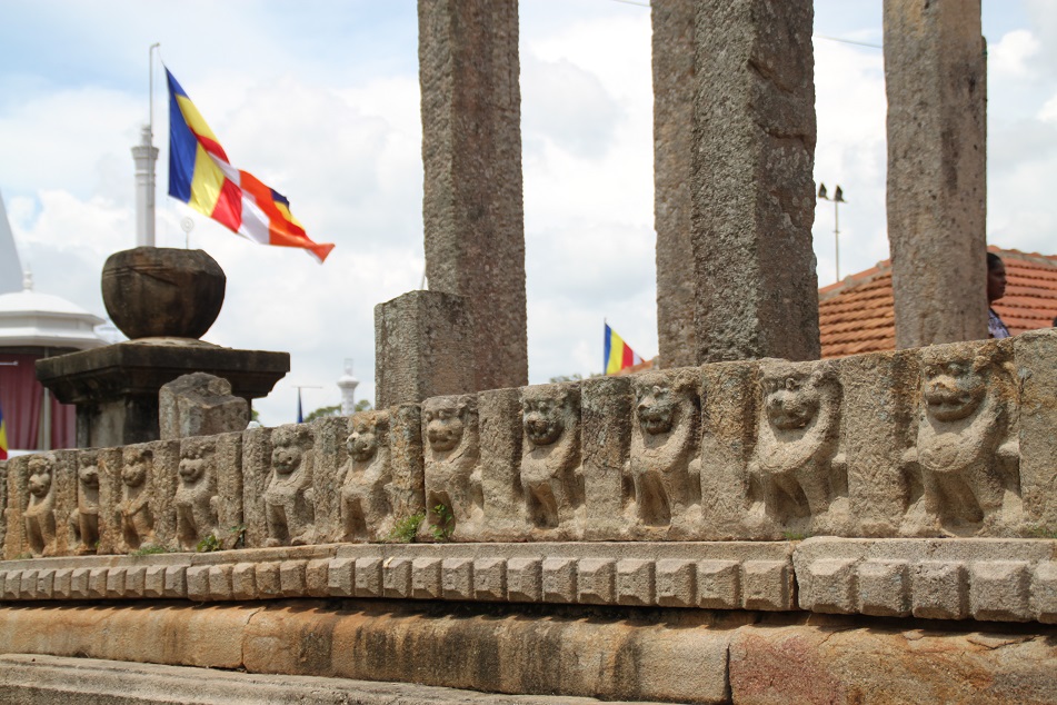 Animal Carvings and Theravada Buddhism Flags at Ruwanwelisaya