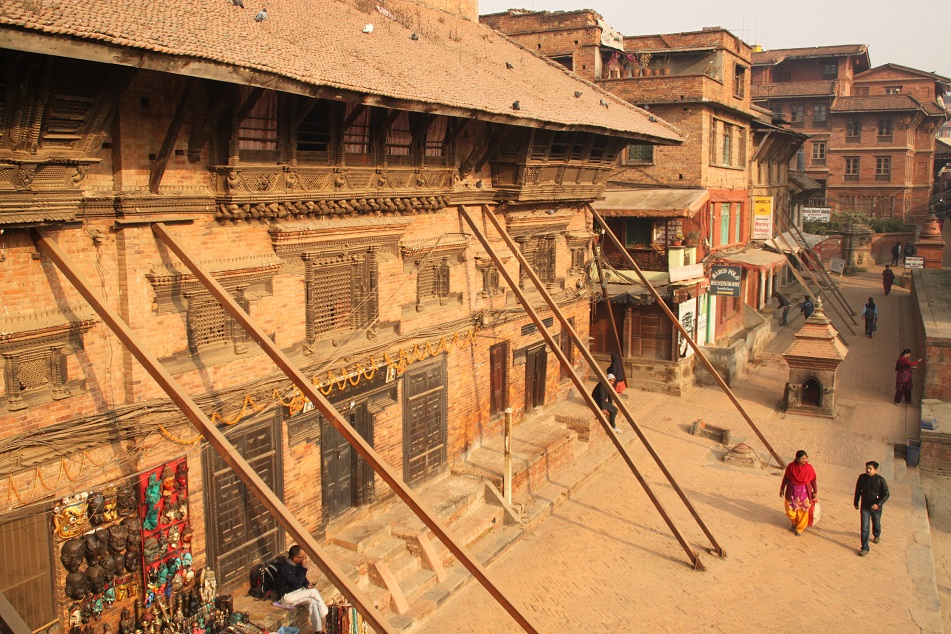 Wooden Beams against Leaning Structures, A Common Sight after the 2015 Earthquakes