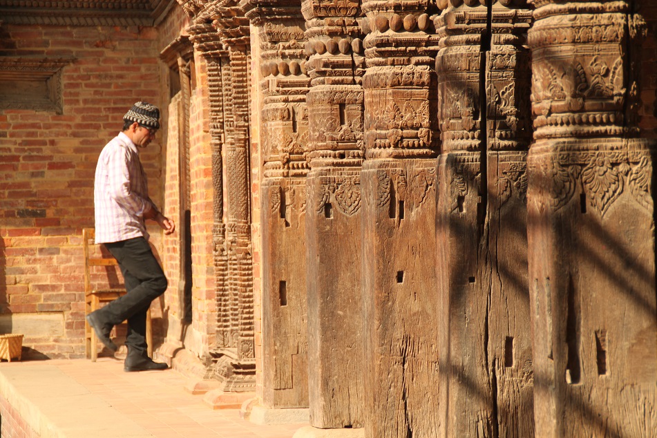 Walking through Ancient Wooden Pillars