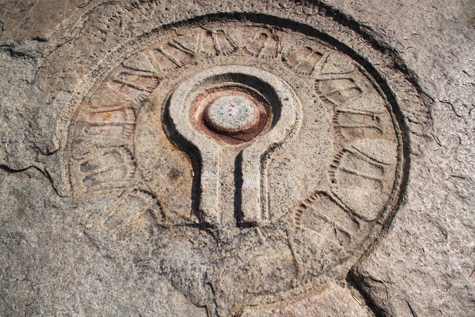Symbols of Shiva Carved on A Rock