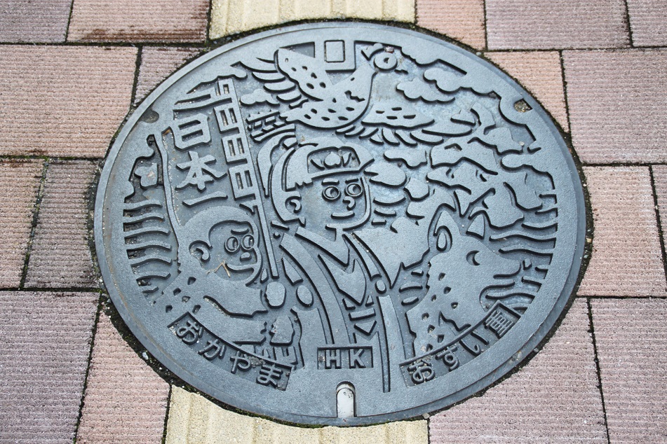 Okayama's Manhole Cover, Depicting Momotaro (A Character of A Japanese Folklore)